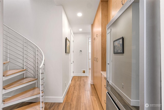 corridor featuring light wood-type flooring