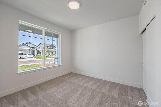 402 Pagget Ave, Winlock, WA 98596 - carpeted spare room featuring baseboards