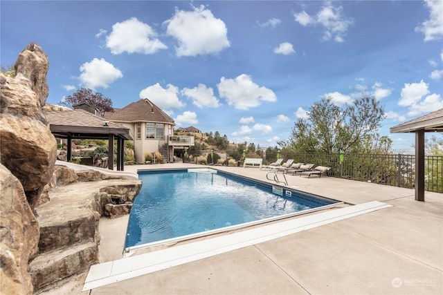 view of pool with a gazebo and a patio area