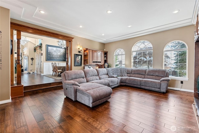 living room with dark hardwood / wood-style flooring