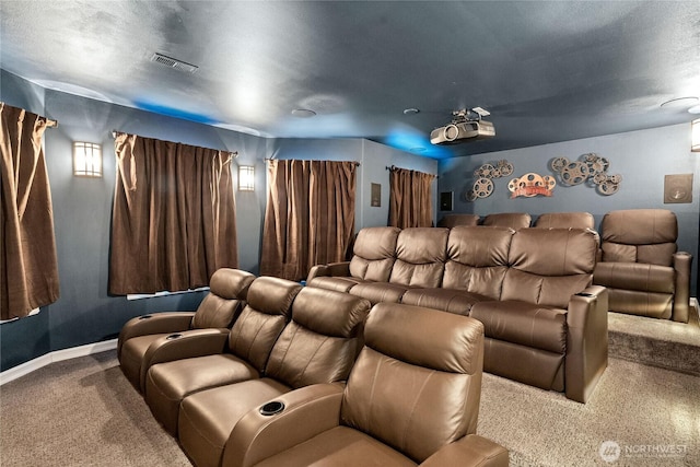 carpeted cinema with a textured ceiling