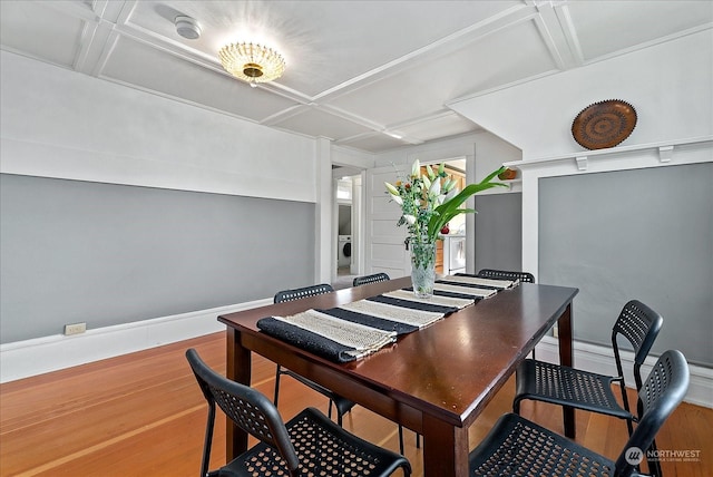 home office featuring hardwood / wood-style flooring and coffered ceiling