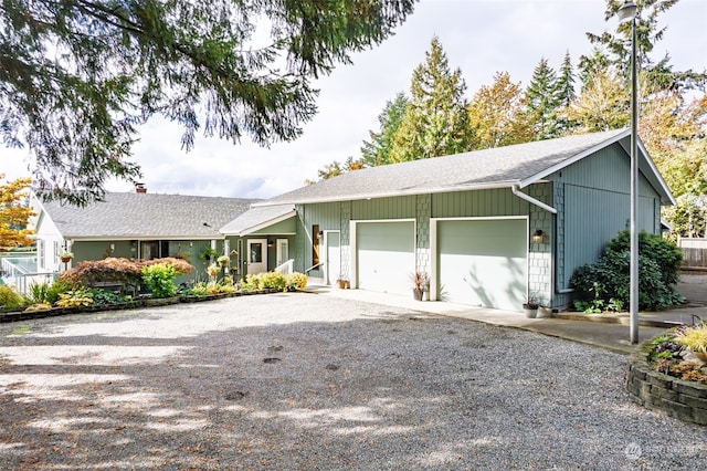 ranch-style house featuring a garage