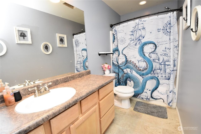 bathroom with walk in shower, vanity, toilet, and tile patterned flooring