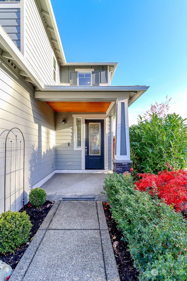 entrance to property with covered porch