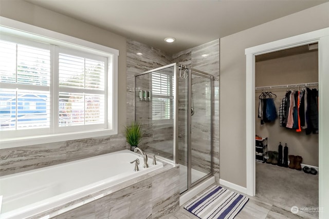 bathroom with independent shower and bath