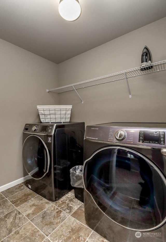 washroom with separate washer and dryer