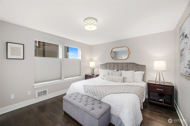 bedroom featuring dark wood-type flooring