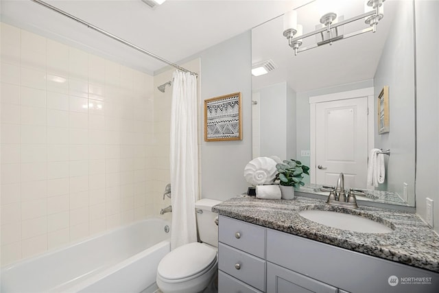 full bathroom featuring shower / tub combo with curtain, vanity, and toilet