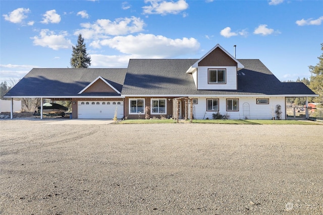 39605 N Elk-Chattaroy Rd, Elk, WA 99009 - view of front of house featuring dirt driveway, an attached carport, and an attached garage