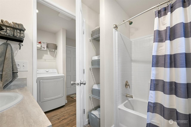 bathroom featuring vanity, hardwood / wood-style flooring, washer / clothes dryer, and shower / tub combo with curtain