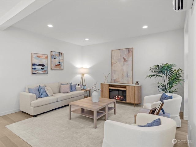 living room with light hardwood / wood-style flooring