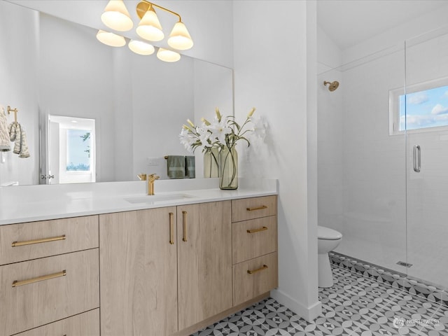 bathroom with a shower with door, toilet, tile patterned floors, and vanity