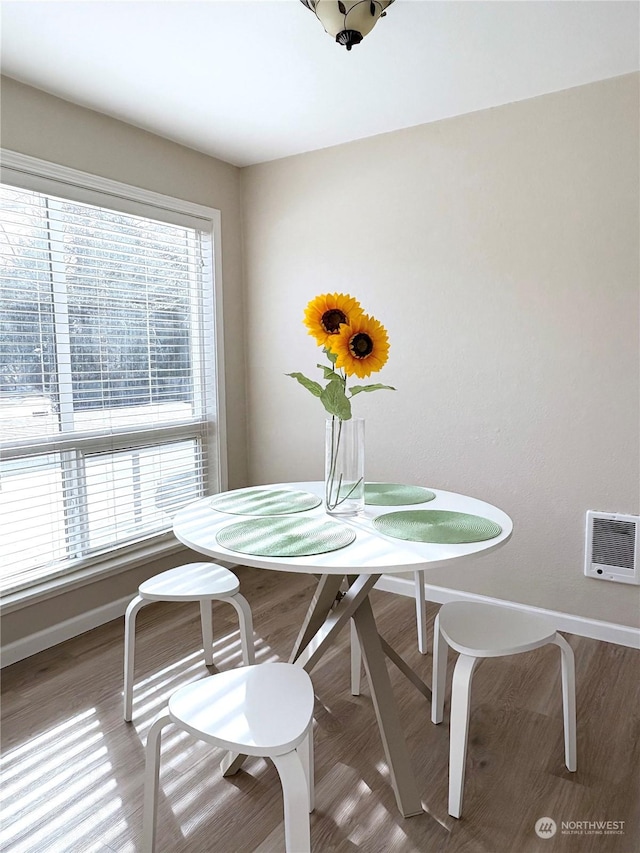 dining room featuring hardwood / wood-style flooring