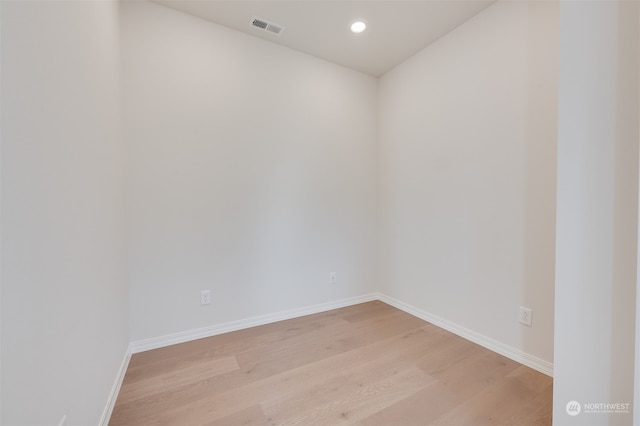 unfurnished room featuring light hardwood / wood-style flooring