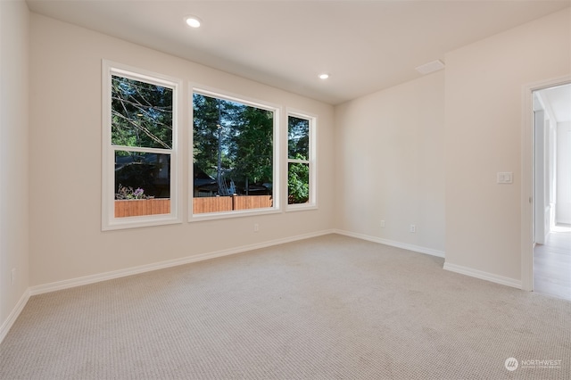 view of carpeted spare room