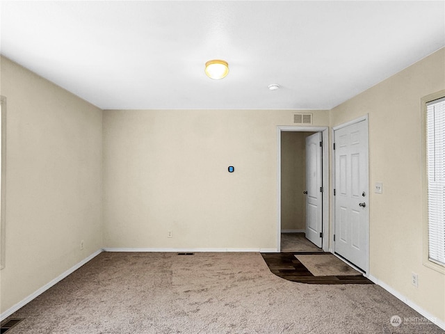 empty room with carpet floors