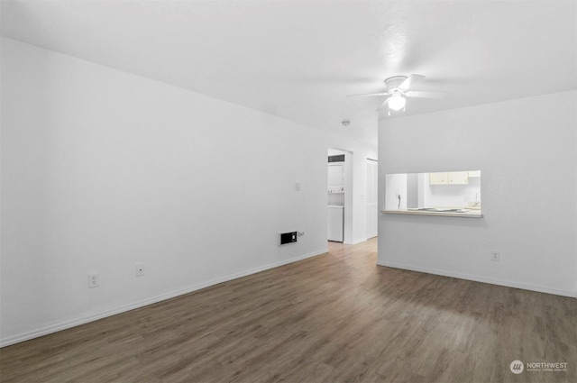 unfurnished room featuring hardwood / wood-style floors and ceiling fan