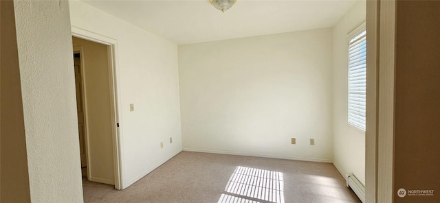 spare room featuring baseboard heating