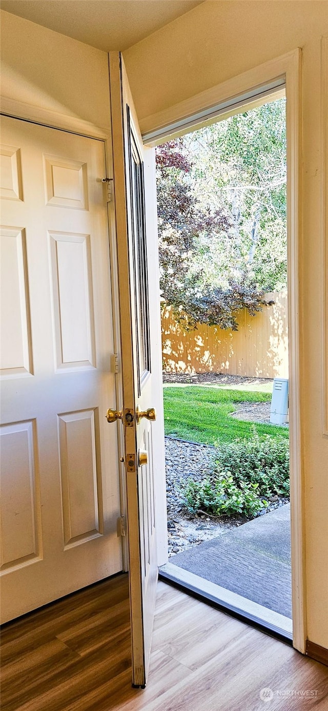 doorway featuring hardwood / wood-style floors