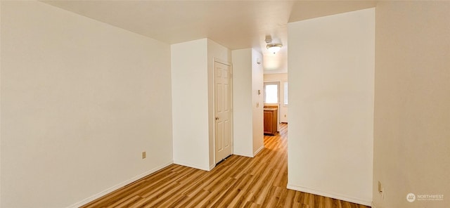 hall featuring light wood-type flooring