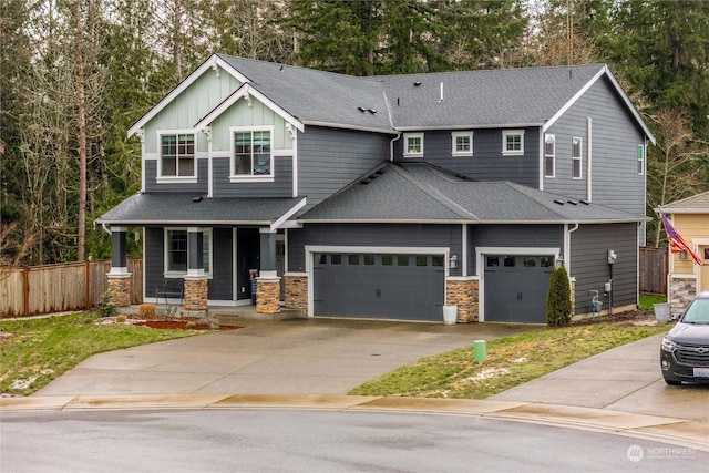 craftsman-style house featuring a garage and a porch