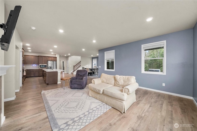 living room featuring light wood-type flooring