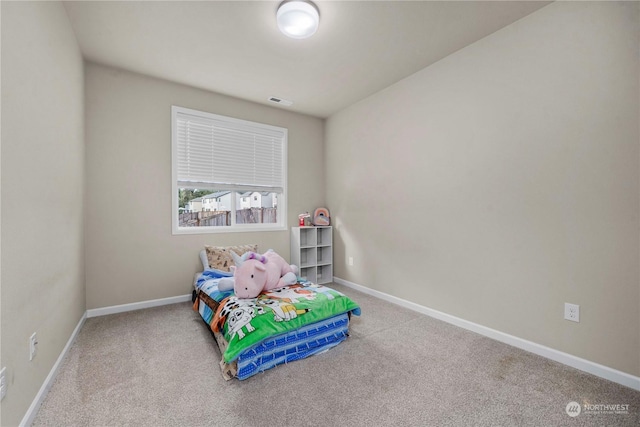 bedroom featuring carpet flooring