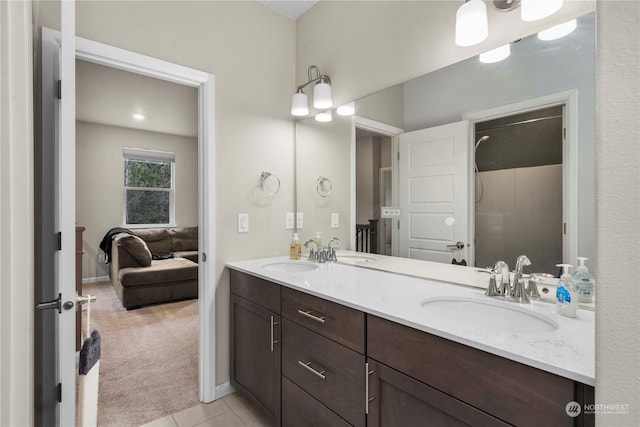 bathroom with vanity and tile patterned floors