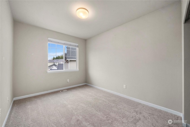 view of carpeted spare room