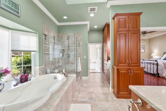 bathroom with ornamental molding, shower with separate bathtub, vanity, and ceiling fan