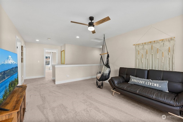 living room featuring ceiling fan and carpet flooring