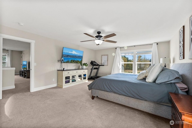 bedroom with ceiling fan and carpet flooring