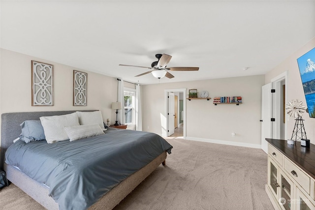 bedroom with light colored carpet and ceiling fan