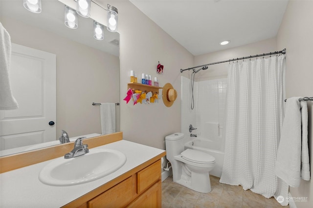 full bathroom featuring vanity, toilet, tile patterned flooring, and shower / bath combo