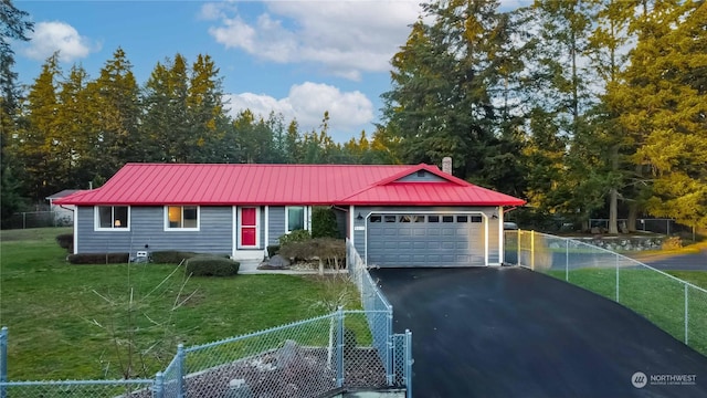 ranch-style house with a garage and a front yard