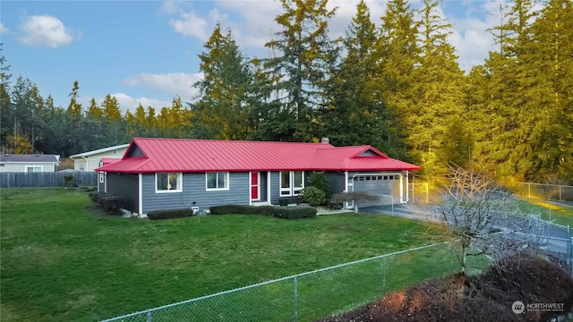 single story home with a garage and a front yard