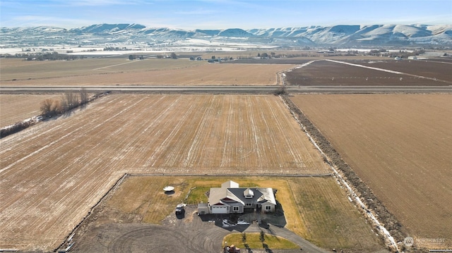 drone / aerial view featuring a mountain view