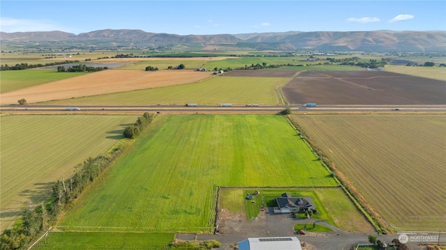 aerial view featuring a mountain view and a rural view