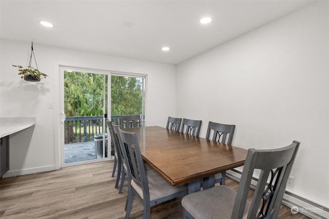 dining room with light hardwood / wood-style flooring