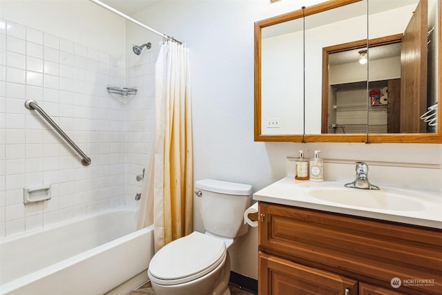 full bathroom featuring vanity, toilet, and shower / tub combo