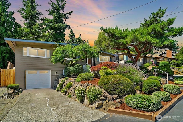 view of front of home with a garage