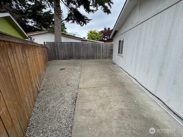 375 Union Ave SE Unit 125, Renton, WA 98059 - fenced backyard featuring a patio area