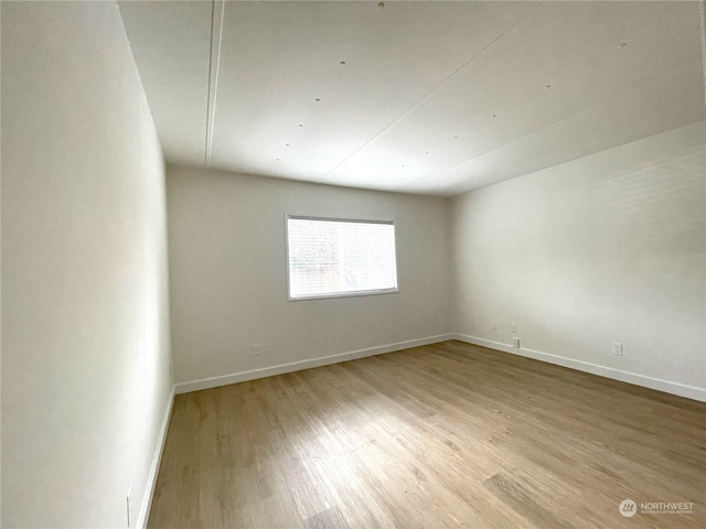 empty room featuring light hardwood / wood-style floors