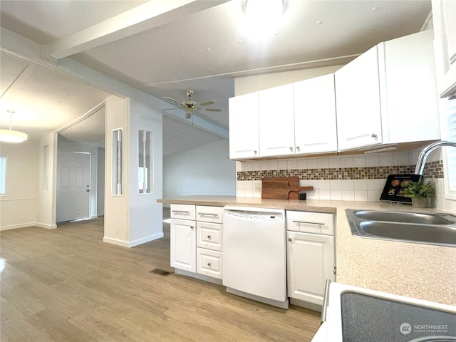 kitchen featuring sink, white cabinetry, tasteful backsplash, light hardwood / wood-style flooring, and white dishwasher