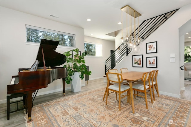 dining room featuring light hardwood / wood-style flooring