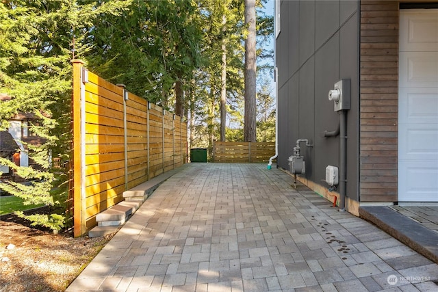 view of patio with a garage