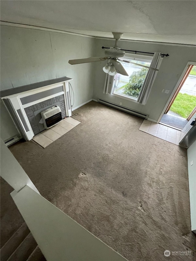 unfurnished living room with ceiling fan, light colored carpet, and a baseboard heating unit