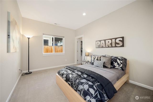 carpeted bedroom with recessed lighting, visible vents, and baseboards