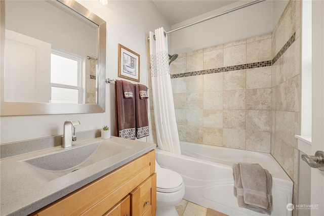 full bathroom with tile patterned flooring, vanity, shower / bath combination with curtain, and toilet